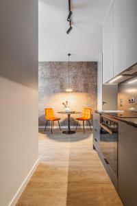 CHRONOS APARTAMENTY Studio z Klimatyzacją na Warszawskiej Woli od Renters Prestige