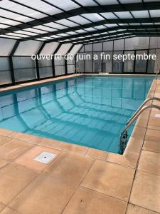 Appartements Mailh- Massibe T2 5 pers climatisation piscine couverte linge de maison inclus parking jardin clos : photos des chambres
