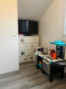 Maisons de vacances Maison pour 4 a 8 personnes a 15 min de Disney : photos des chambres
