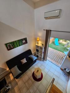 Appart'hotels Gite Le Muscat L'Escapade Des Flamants Roses : photos des chambres