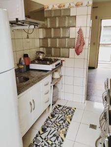 Apartmento em praia Perequê-Açu