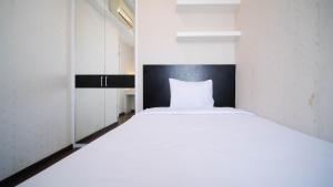 Spacious and Strategic 2BR Apartment at Trillium Residence By Travelio