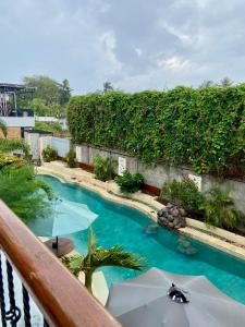 Phòng Deluxe Giường Đôi Có Ban Công (Deluxe Double Room with Balcony)