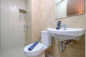 Nice and Comfort 2BR Apartment at Transpark Cibubur By Travelio