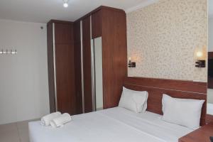 Great Location and Comfy 1BR Apartment at Woodland Park Residence By Travelio