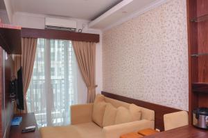 Great Location and Comfy 1BR Apartment at Woodland Park Residence By Travelio