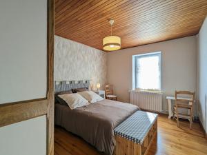 Maisons de vacances Gite de Charme pour 6 personnes avec Terrasse et Wifi - FR-1-582-529 : photos des chambres