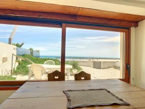 Appartement T4 en bord de plage avec terrasse et parking à Carnon - FR-1-715-103