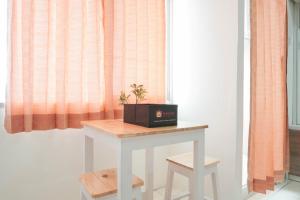 Simply Modern Studio Apartment at Centro City Residence By Travelio