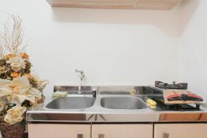 Simply Modern Studio Apartment at Centro City Residence By Travelio