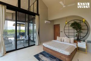 StayVista at The Nest at Canary Farms - Pool, Lawn