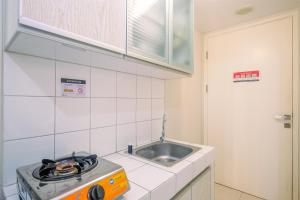 Simply Good Studio Room at Springlake Summarecon Apartment By Travelio