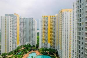 Simply Good Studio Room at Springlake Summarecon Apartment By Travelio