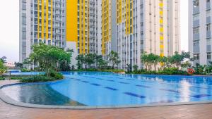 Simply Good Studio Room at Springlake Summarecon Apartment By Travelio