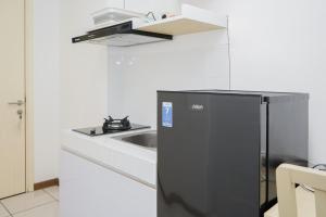 Comfort with Garden View Studio Apartment M-Town Residence By Travelio