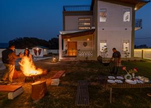 SaffronStays Sher Bagh - 4BR eco-friendly pool villa with jungle trails, farm-to-table meals & bonfire nights near Corbett Park