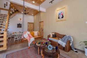 SaffronStays Sher Bagh - 4BR eco-friendly pool villa with jungle trails, farm-to-table meals & bonfire nights near Corbett Park