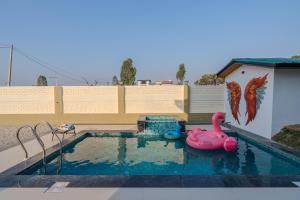SaffronStays Sher Bagh - 4BR eco-friendly pool villa with jungle trails, farm-to-table meals & bonfire nights near Corbett Park