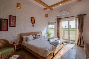SaffronStays Sher Bagh - 4BR eco-friendly pool villa with jungle trails, farm-to-table meals & bonfire nights near Corbett Park