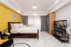 Greenbelt Makati Condo with Balcony & Park Views