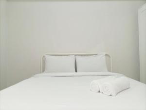 Comfortabe and Tidy Studio at Barsa City Apartment By Travelio
