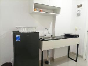 Comfortabe and Tidy Studio at Barsa City Apartment By Travelio