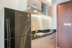 Warm & Cozy Studio at Signature Park Grande Apartment By Travelio