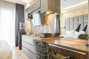 Warm & Cozy Studio at Signature Park Grande Apartment By Travelio