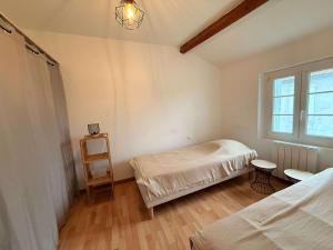 Maisons de vacances Maison du canton proches commerces : photos des chambres