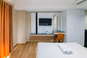 Great Deal and Homey Studio Room Patraland Amarta Apartment By Travelio