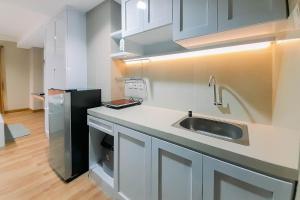 Great Deal and Homey Studio Room Patraland Amarta Apartment By Travelio