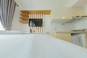 Relaxing Studio at Sky House BSD Apartment By Travelio