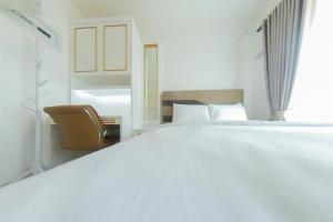 Relaxing Studio at Sky House BSD Apartment By Travelio