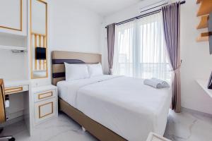 Relaxing Studio at Sky House BSD Apartment By Travelio
