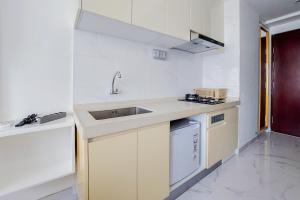 Relaxing Studio at Sky House BSD Apartment By Travelio