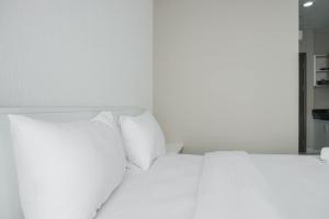 Modern and Comfort Studio at Ciputra International Apartment By Travelio