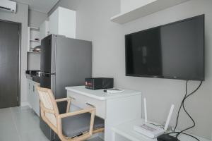Modern and Comfort Studio at Ciputra International Apartment By Travelio