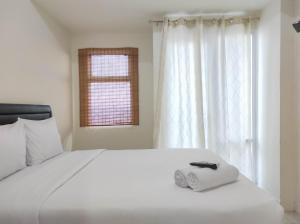 Nice and Cozy Studio at Vida View Makassar Apartment By Travelio