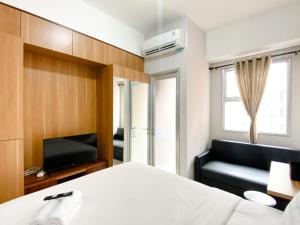 Cozy and Simply Studio Transpark Juanda Bekasi Timur Apartment By Travelio