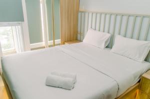 Nice and Simply Studio at Amazana Serpong Apartment By Travelio