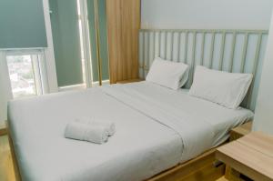 Nice and Simply Studio at Amazana Serpong Apartment By Travelio