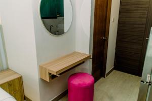 Nice and Simply Studio at Amazana Serpong Apartment By Travelio