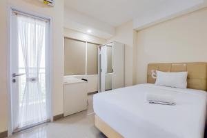 Comfort and Homey Studio Apartment at B Residence By Travelio