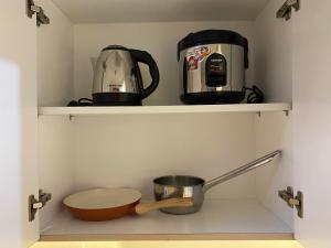 Fancy and Nice Studio at The Alton Apartment By Travelio