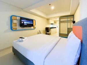 Modern Look Studio Apartment at Marquis de Lafayette By Travelio