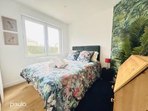 Appartements Le Petit Monampteuil : photos des chambres