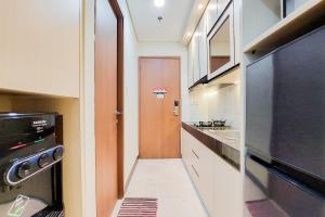 Homey and Minimalist Studio Apartment B Residence By Travelio