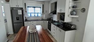 Relax in Style at La Kruger Blue, Langebaans Premier Holiday Home