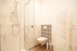 Appartements Appartement Hyper-Centre : photos des chambres