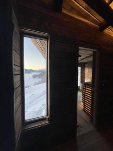 The blue room at Vevstogo - cosy with a mesmerizing view, sauna and eco living in an old school house